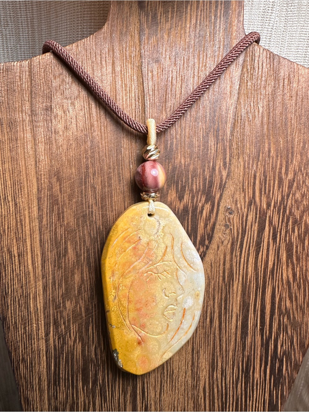 Coral Fossil Lady Profile Pendant Necklace on Brown Rope - Picture 7 of 14